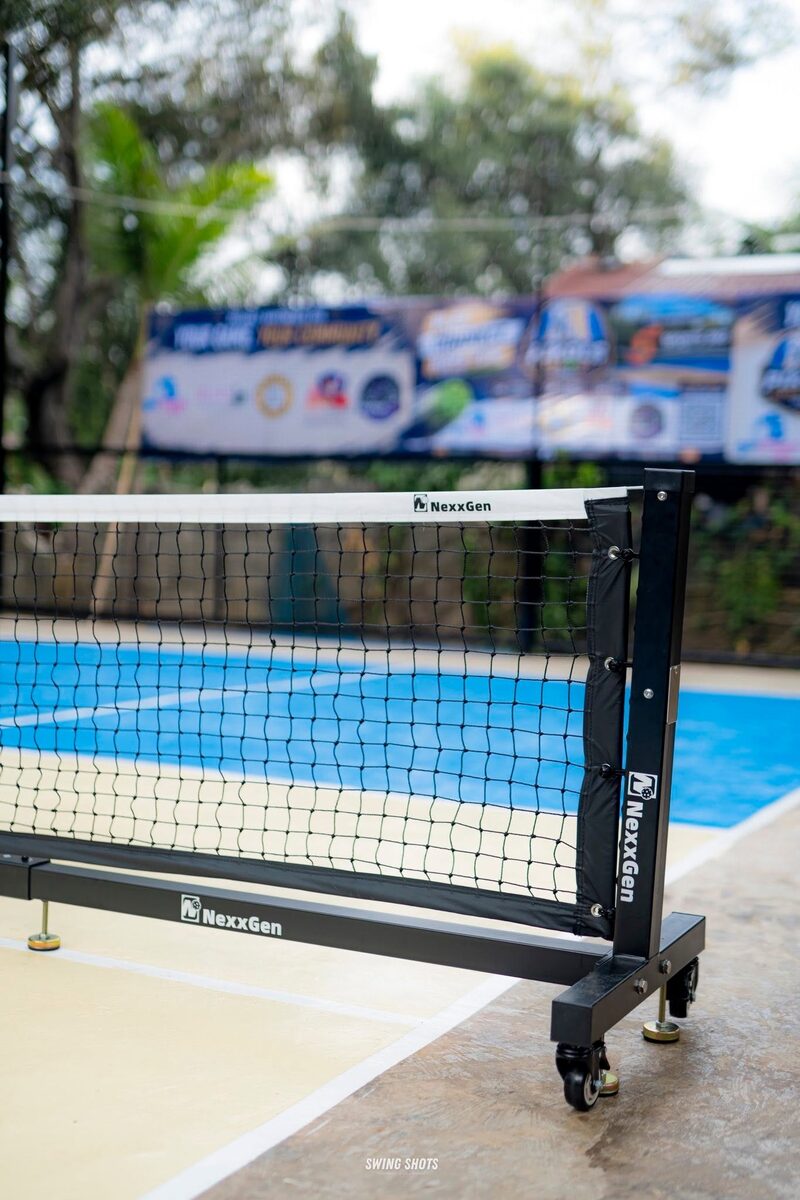 PIKOLS Hideout pickleball net and blue court