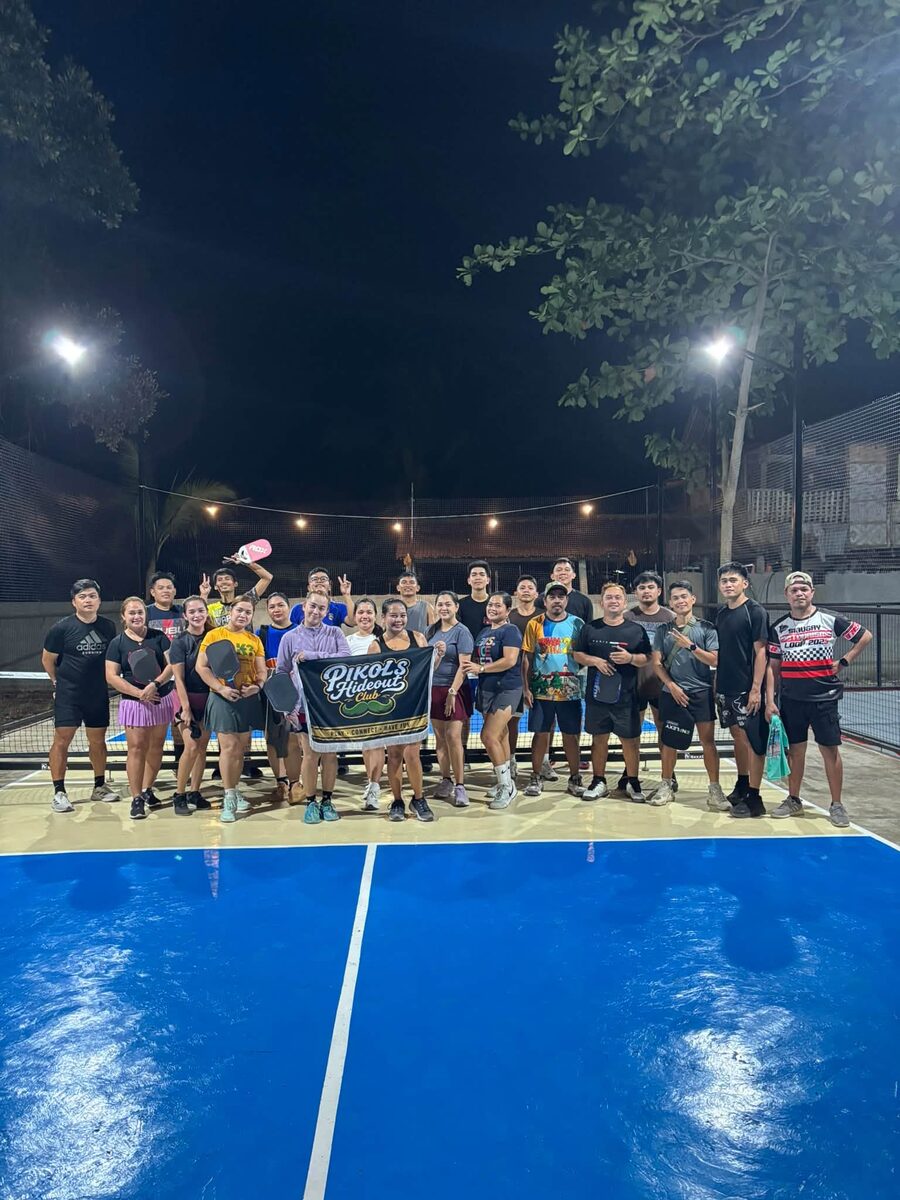Players gathered at PIKOLS Hideout pickleball court